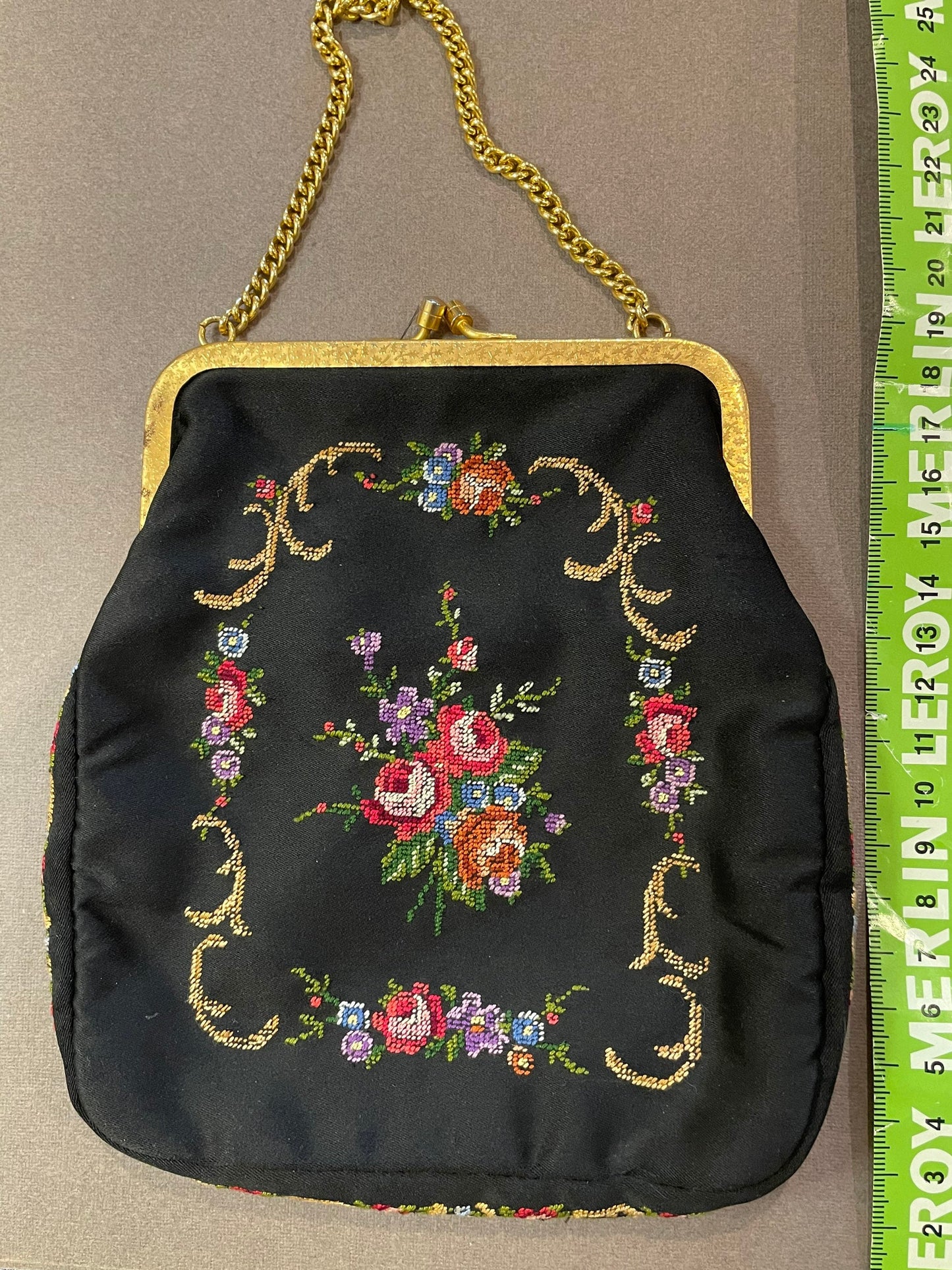 Small vintage embroidered fabric bag on a chain