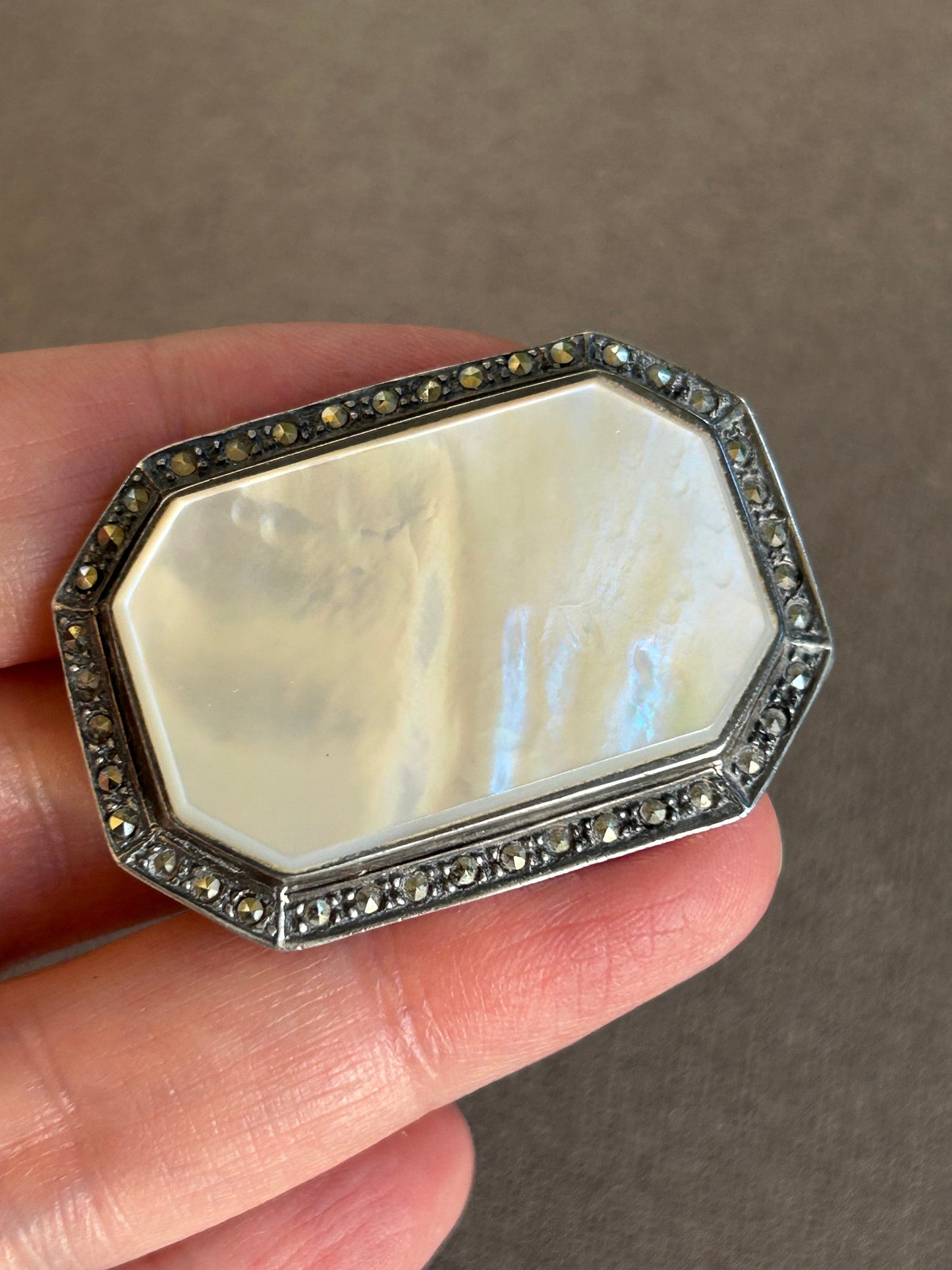 Brooch made of mother of pearl and 925 silver with marcasites