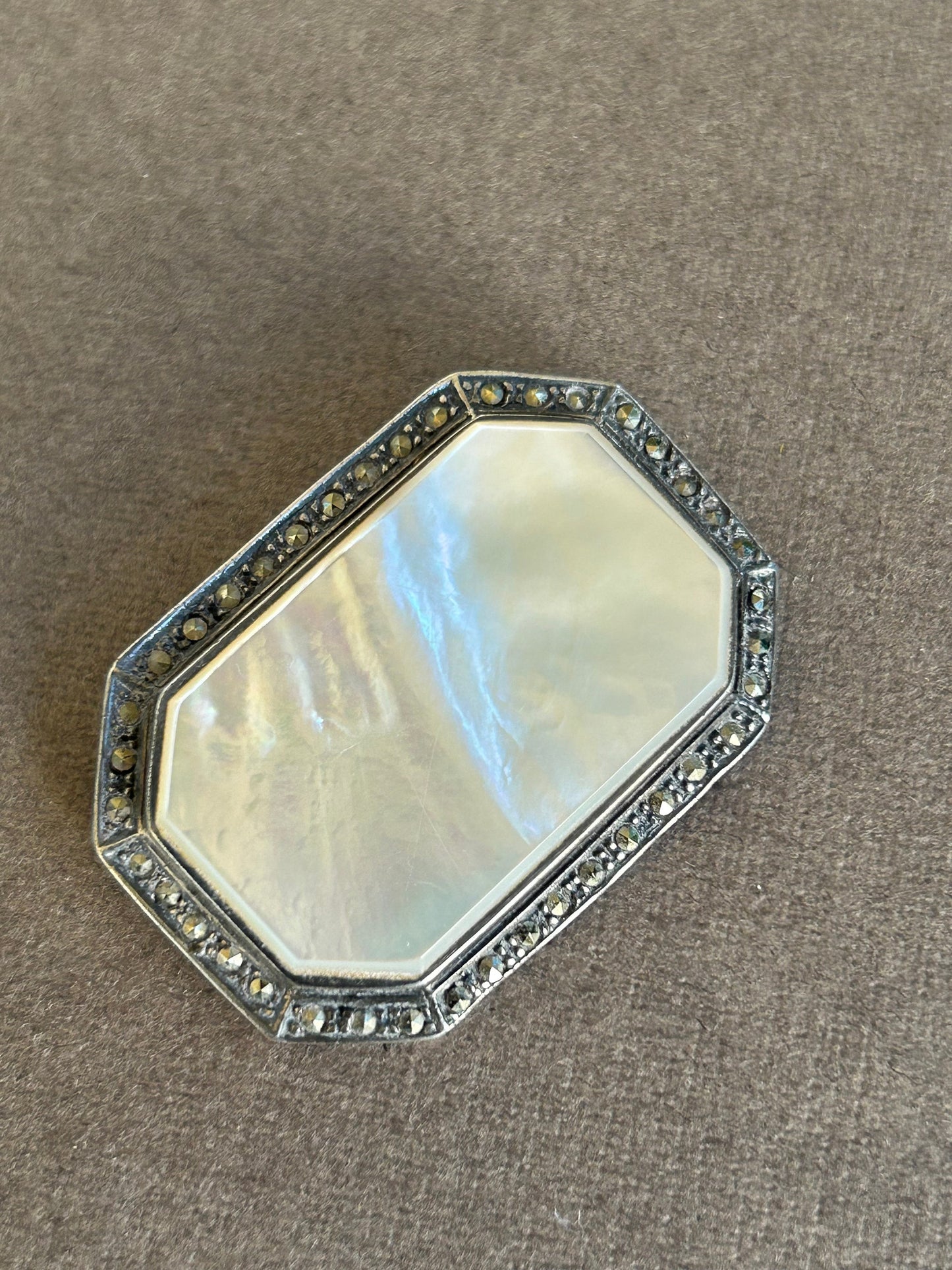 Brooch made of mother of pearl and 925 silver with marcasites